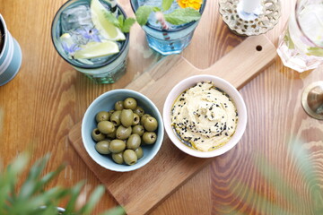 Humus and olives.
Culinary photography. Food styling.