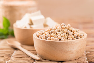 Soybean seeds with tofu in a wooden bowl, Healthy food