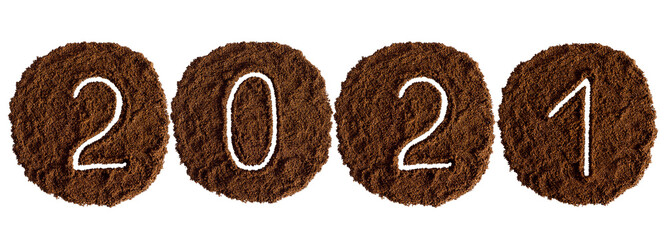 2021 decorated with ground coffee on white background	
