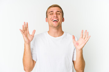 Young caucasian handsome man joyful laughing a lot. Happiness concept.