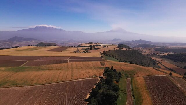 Popo & izta volcanoes seen from mexico city