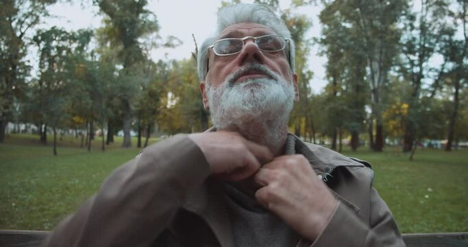 Sick male choking, sitting outdoors, gasping of air, health problems, asthma