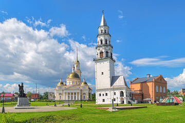 Fototapeta na wymiar Leaning Tower of Nevyansk, Transfiguration Cathedral and Peter the Great and Nikita Demidov Monument in Nevyansk, Sverdlovsk Oblast, Russia
