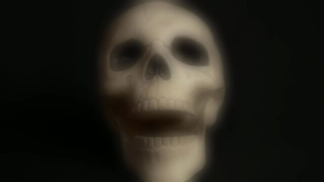 Stop motion ghostly skull animation with chattering teeth black background