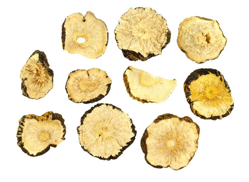 Black Maca or Peruvian Ginseng Dry Root Slices (Lepidium Meyenii). Isolated on White.