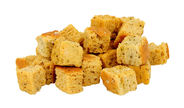 Group of baked crusty bread cube croutons isolated on a white background