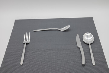 table top cutlery on a gray background