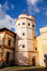 Fototapeta na wymiar Nymburk landmark, historic water tower Turkish Tower (Turecka vez) in autumn sunny day, Renaissance style, end of the 16th century, Nymburk, Central Bohemia, Czech Republic