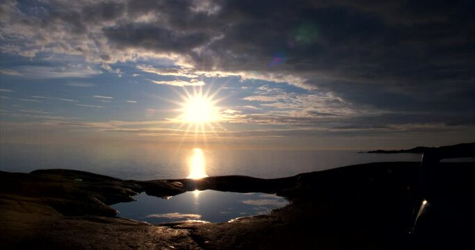 timelapse of dark sunset on ocean horizon at Northernmost point of Europe