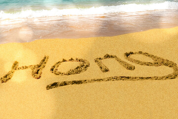 Hong title on the sand beach of the South China sea.
