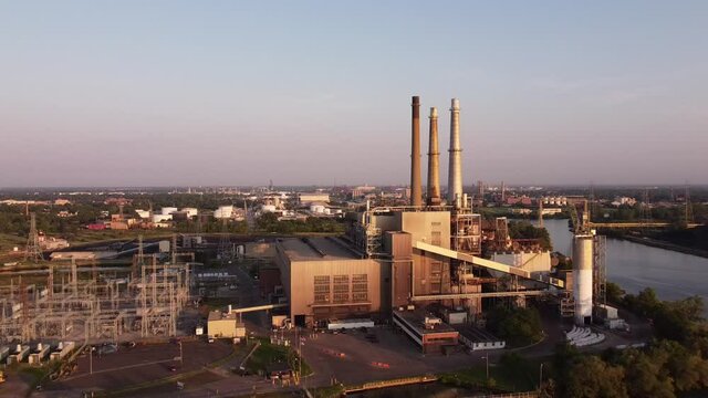 DTE River Rouge Power Plant At Belanger Park In Detroit, Michigan On A Sunrise - drone pullback
