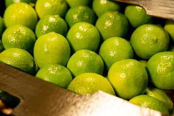 natural fruits limes at the grocery store.Farmer market department at supermarket store.
