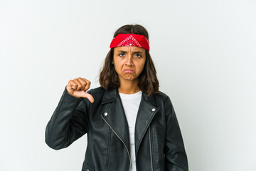 Young latin rocker woman isolated on white background