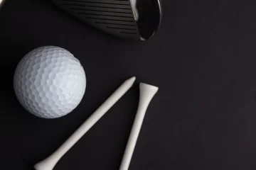Wandcirkels aluminium golf ball and iron stick © Rojo