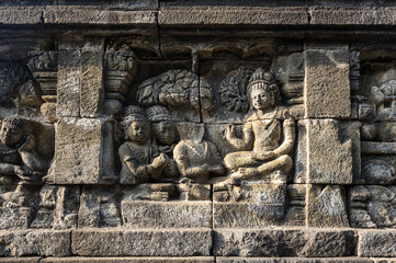 Bas-relief statue at Borobudur, a 9th-century Mahayana Buddhist temple in Central Java