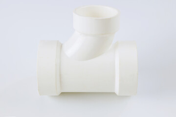 Plumbing waste water drain PVC connecting plastic pipes on a white background