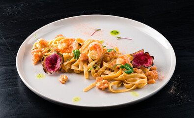 Tagliatelle with shrimp, fettuccini pasta with shrimp Italian food style