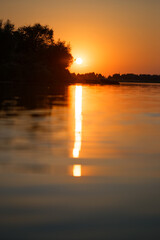 colorful beautiful red sunset over the river