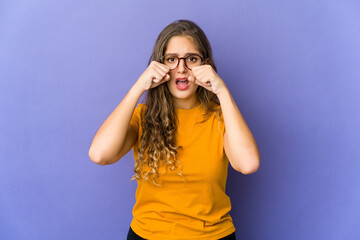 Young caucasian cute woman whining and crying disconsolately.