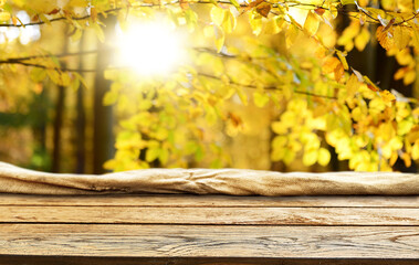 Naklejka na ściany i meble Empty old wooden table background - autumn background