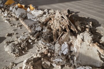 Pile of fallen construction material debris in an old abandonad building
