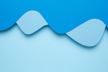Abstract paper cut light sea blue waves art background, pastel colors with copyspace