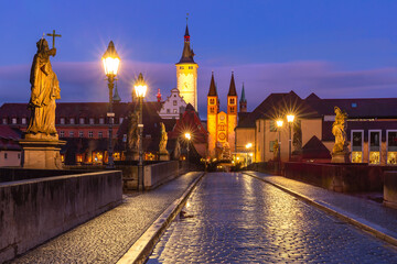 Old Main Bridge, Alte Mainbrucke with statues of saints, Cathedral and City Hall in Old Town of...