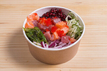 Poke with avocado, tuna, salmon, cucumber.