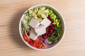 Poke with avocado, cheese feta, pomegranate.