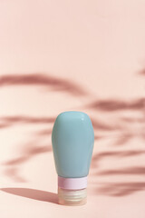 Obraz premium Cosmetic tube for cream, gel, lotion. Beauty product package, mock up plastic container with hard shadows