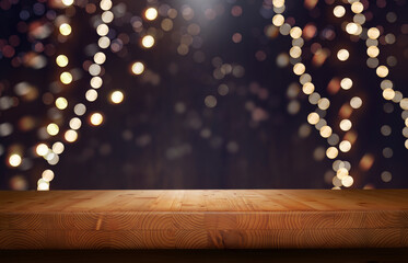 A wood table, tabletop product display  with a festive Christmas background of hanging fairy lights...