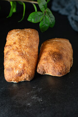 ciabatta fresh bread yeast-free sourdough or yeast dough pore structure on the table healthy snack ingredient top view copy space food background rustic