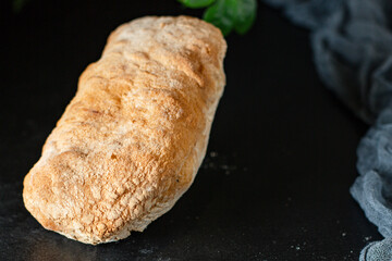 ciabatta fresh bread yeast-free sourdough or yeast dough pore structure on the table healthy snack ingredient top view copy space food background rustic