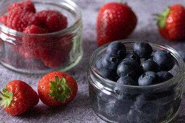 Blueberries and Raspberries in a Glass Bowl