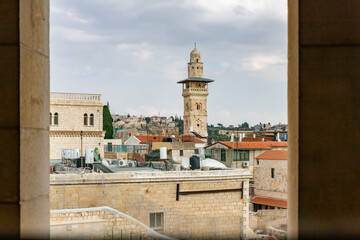 Fototapeta na wymiar View from the Austrian Hospice window to the old city in the direction of the Temple Mount in the old city of Jerusalem in Israel