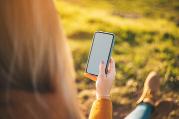 Mockup of a woman with her phone