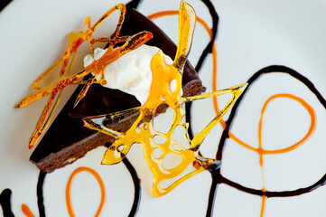 Chocolate cake with espresso ice cream. Classic American or French bakery favorite. Cookies, whipped cream, cakes, chocolate syrup butter, eggs and vanilla beans.