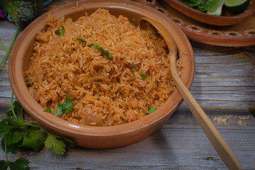 Mexican, Spanish rice served in clay bowl