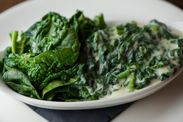Creamed spinach roasted in garlic, onions, olive oil and fresh herbs and spices. Classic American steakhouse or French bistro appetizer or side dish.