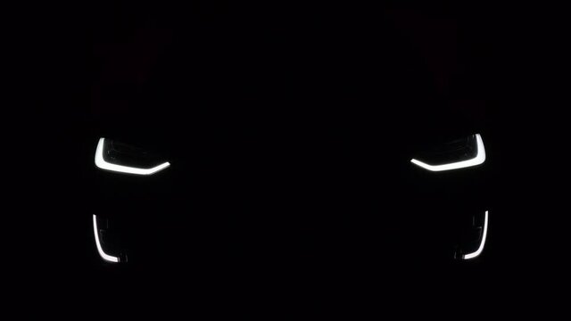 4K video. flashing turns Car working lights. The Bright Future of Electric Cars: A Demonstration of the Headlights in Action	
