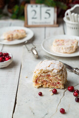 Meringue roulade with cranberries on Nordic style Christmas table