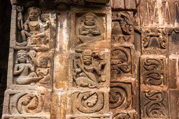Beautiful stone carvings on the walls of a Hindu temple