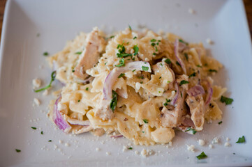 Pasta with meatballs, marinara sauce, Parmesan cheese and fresh Italian parsley. Classic American or Italian restaurant favorite. Homemade pasta with sauces, meats and cheeses.