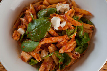 Pasta with meatballs, marinara sauce, Parmesan cheese and fresh Italian parsley. Classic American or Italian restaurant favorite. Homemade pasta with sauces, meats and cheeses.