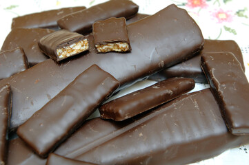Italian nougat called torroncino di San Marco dei Cavoti in the area of Benevento in the Campania region covered in chocolate and with very crunchy hazelnuts
