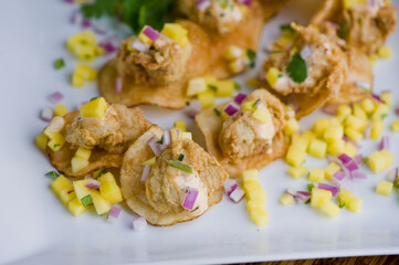 Fried oysters. Fresh oysters fried and served with garlic, shallots, cocktail sauce, mignonette sauce and fresh lemons and limes. Classic American steakhouse or French bistro appetizer.
