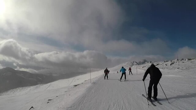 skiing. ski resort. winter vacation, weekends holidays, snow-capped mountains in fog. subjective dynamic camera. unrecognizable people. Slovakia Jasna. FullHD footage.