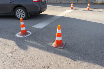 Traffic cones in driving school or test. car at the training site