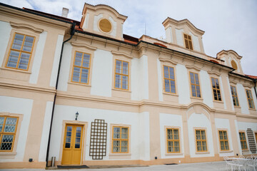 Fototapeta premium Loucen Rococo castle surrounded by a vast English park, Romantic baroque chateau and gardens with mazes and labyrinths in autumn day, Central Bohemia, Czech republic
