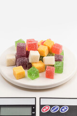 Colored candy bars on a white background